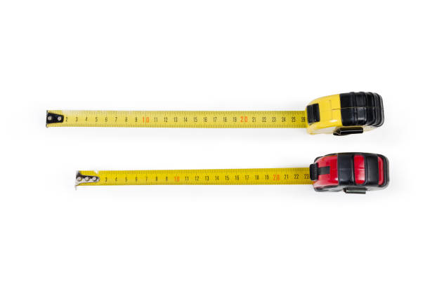 istock Two self-retracting tape measure with metric scales 1206810825