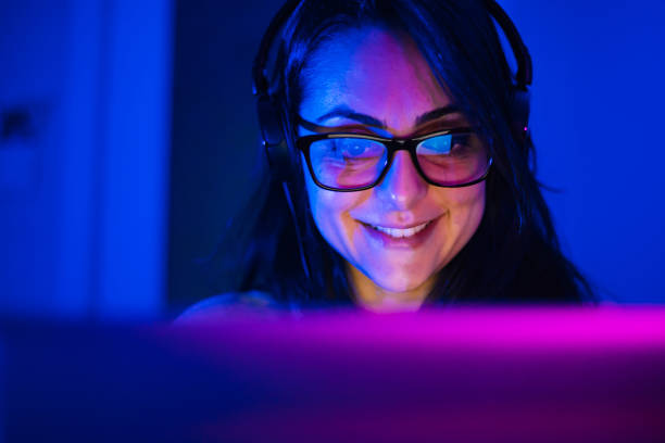 istock Beautiful Friendly Pro Gamer Girl Does Video Game Gameplay stream 1206810844