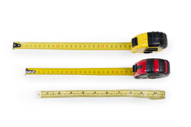istock Two metal self-retracting tape measures and plastic tape measure 1206810916
