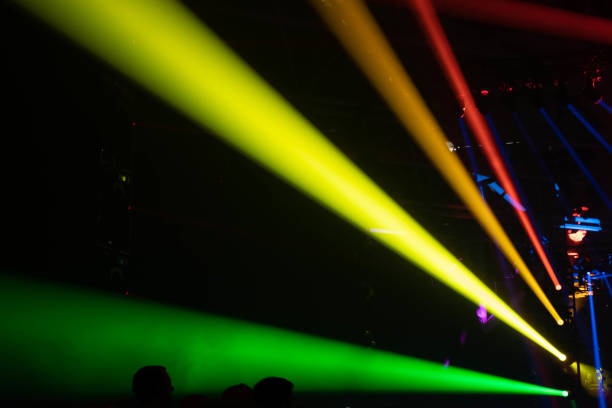 istock Stage lights with colored spotlights and smoke, rainbow 1206811201