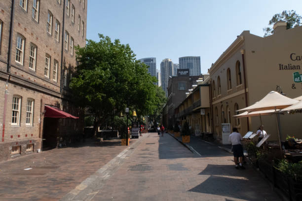 The Rocks Area in downtown Sydeney next to Sydney Harbour is an early historical settlement of Sydney, NSW, Australia View of the main area of The Rocks historical area in Sydney Australia with a sandstone monument dedicated to the first settlers of Australia. 8564 stock pictures, royalty-free photos & images