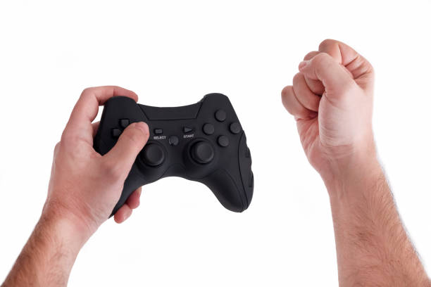 istock Male Hand Holding Joypad, Winning Gesture 1206813319