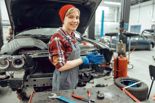 istock Young auto mechanic standing in a garage 1206813908