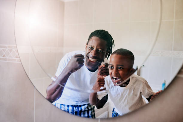 istock Dad says that brushing is simply not enough 1206815091