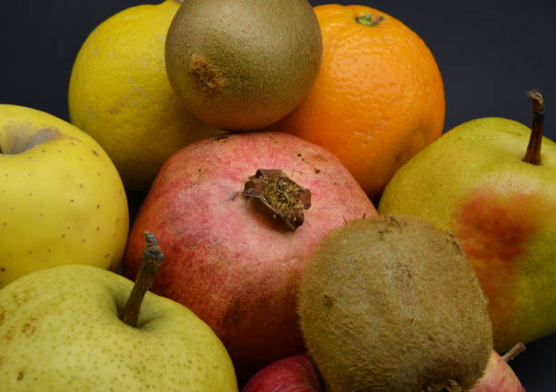 fresh fruits on black background