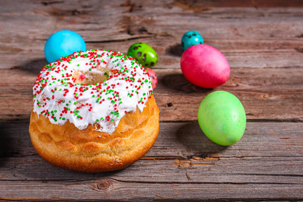 istock easter cake and easter eggs, traditional holiday design (happy easter) menu concept. food background. top view. copy space 1206816397