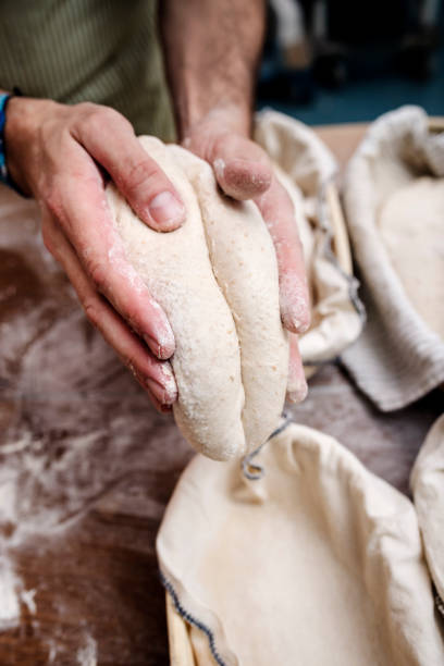 istock Sourdough being shaped prior to proving and baking. 1206816744