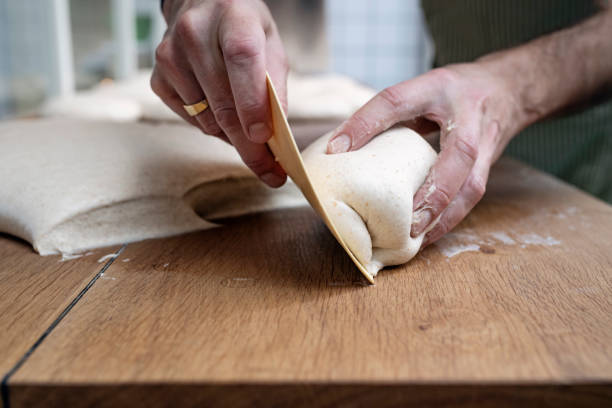 istock Preparing Sourdough bread prior to proving and  baking. 1206817576