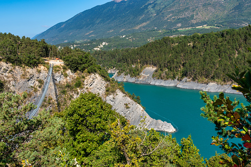 Lac de Monteynard Avignonet is an artificial water reservoir for the Electricite de France power station on the Drac River. It is bounded by the canyons of the Drac and Ebron in France