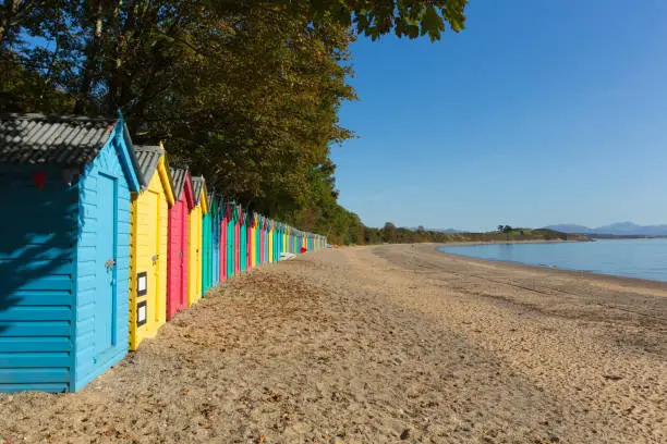 Photo of Colourful beach huts Llanbedrog beach Llyn peninsula Wales