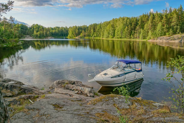 istock Boat launch on lake water. Summer. 1206820770
