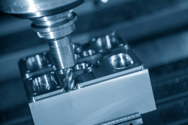 istock The CNC milling machine rough cutting  the injection mold parts by solid flat  endmill tools. 1206822510