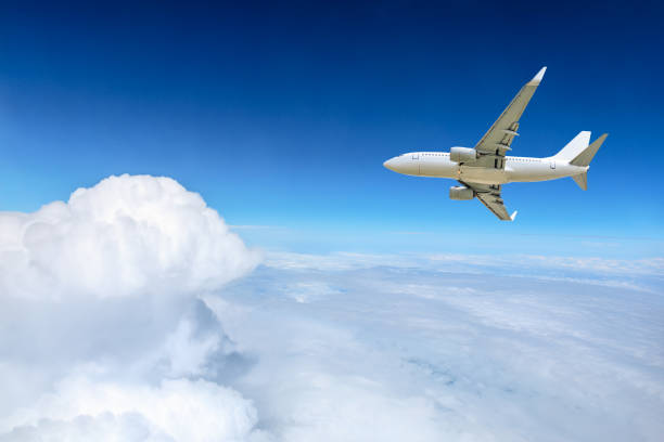 Airplane flying at high altitude and beautiful high-altitude clouds in spring,China