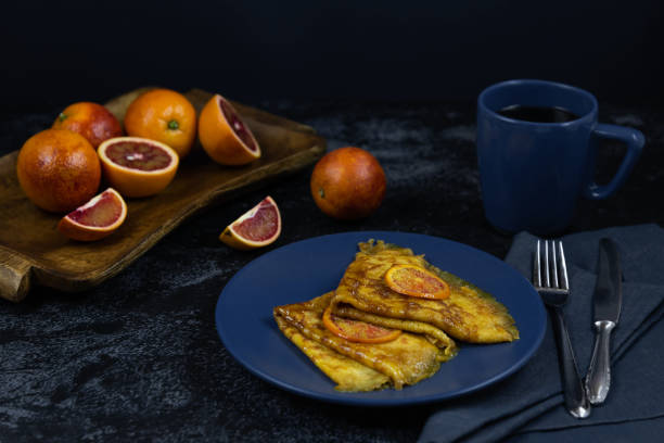istock Suzette crepe pancakes on a dark background 1206825777