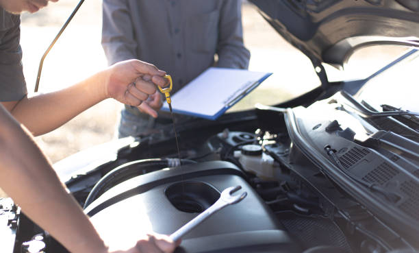 istock Midsection Of Man Working On Car 1206826768
