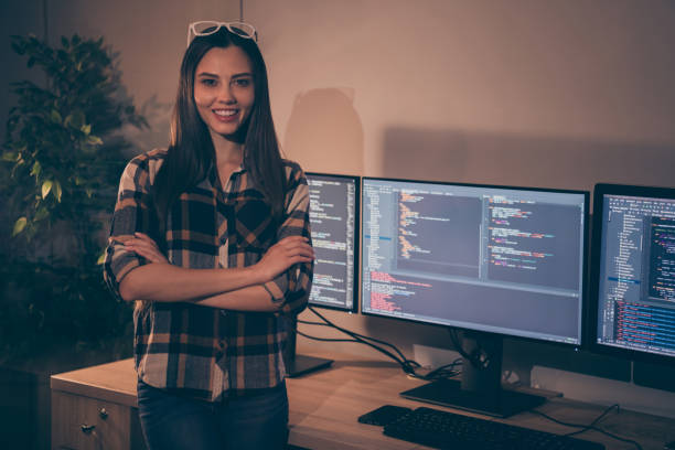 istock Photo of cheerful positive developer with hands folded standing confidently smiling toothily finished working on new project 1206830426