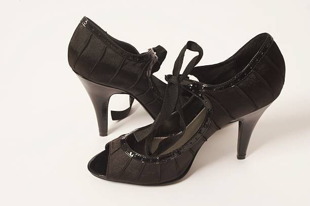 black stylish shoes on white background stock photo