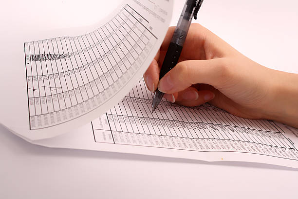 female hand writing a document stock photo