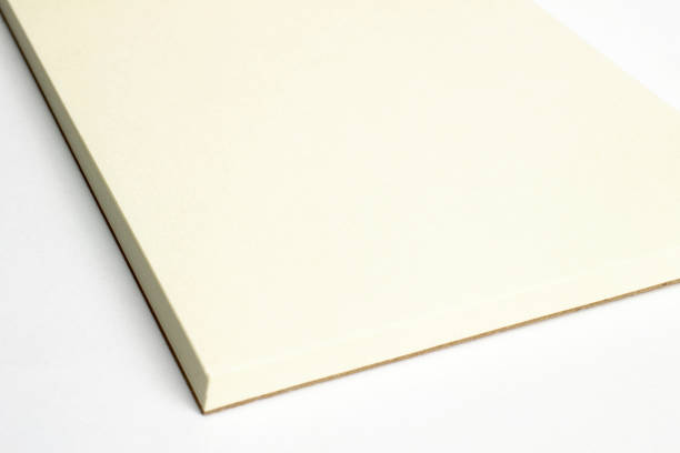 istock Macro of blank opened notebook corner with cardboard hardcover isolated on white as template for presentation, showcase design logo, embossing etc. 1206835553