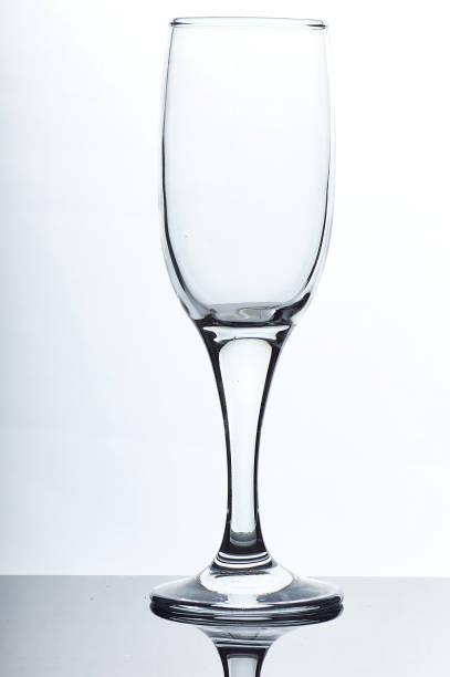 istock set of glass empty glasses and goblets on a gray-white background 1206835896