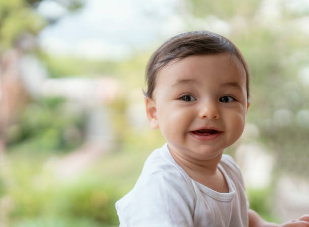 istock One year old baby boy portrait 1206836411
