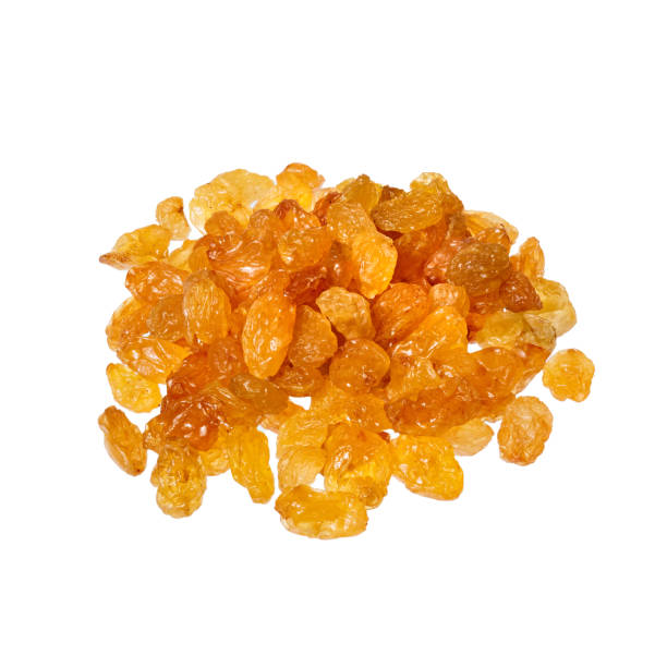 istock Heap of Raisins isolated on white background. 1206837649