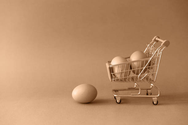 istock Shopping toy trolley with eggs on toning in concept 1206837734