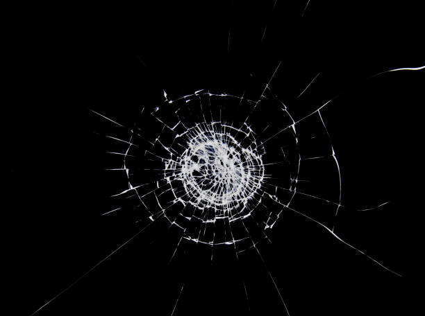 istock Cracks and lines on broken glass. Cracks texture on the window. 1206839942