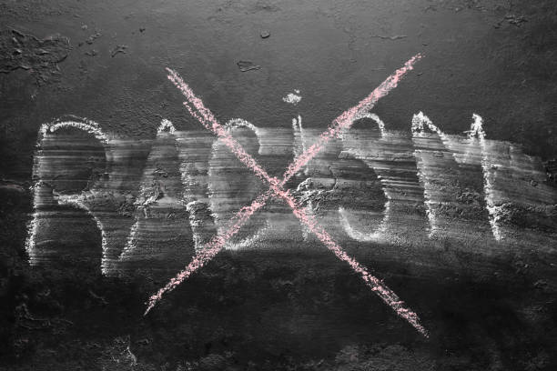 istock crossed out inscription racism concept stop racism, discrimination, racial problems 1206840263
