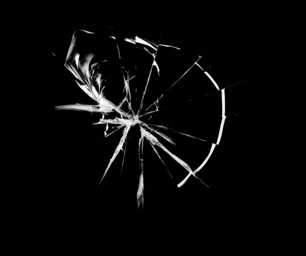 istock Cracks on broken glass from stone impact Abstraction of broken windshield. 1206841082