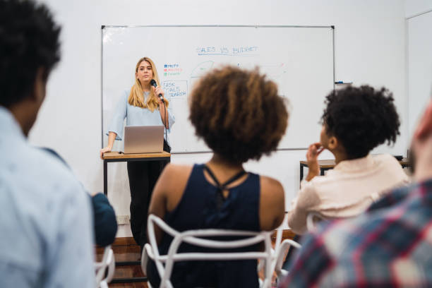 istock business woman explaining plan of work in conference. 1206848000