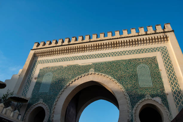 The blue gate in Fez The blue gate to the old town of Fes. The green side of the gate points out of the city. bab boujeloud stock pictures, royalty-free photos & images