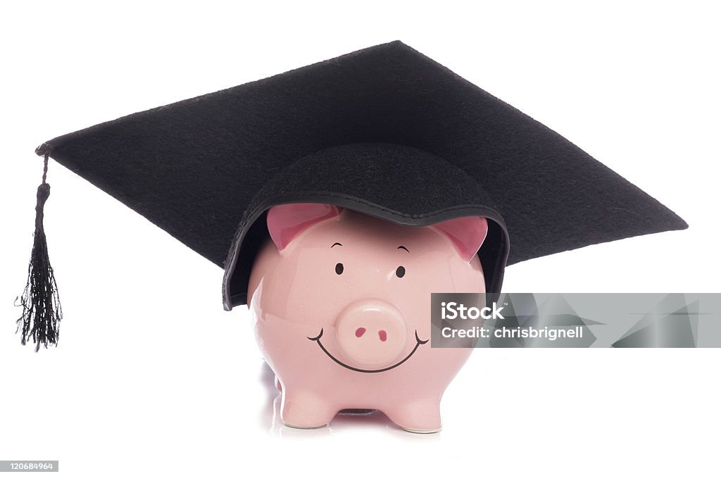 Cappello Piggybank con Tocco accademico - Foto stock royalty-free di Affari