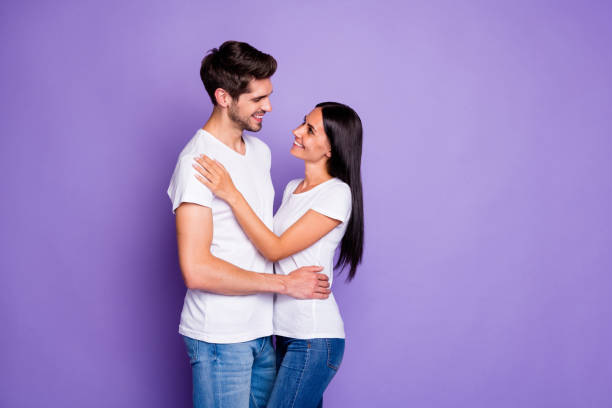 istock Profile side view portrait of his he her she nice attractive affectionate cheerful sweet couple soulmate embracing spending vacation isolated on purple violet lilac color pastel background 1206850768