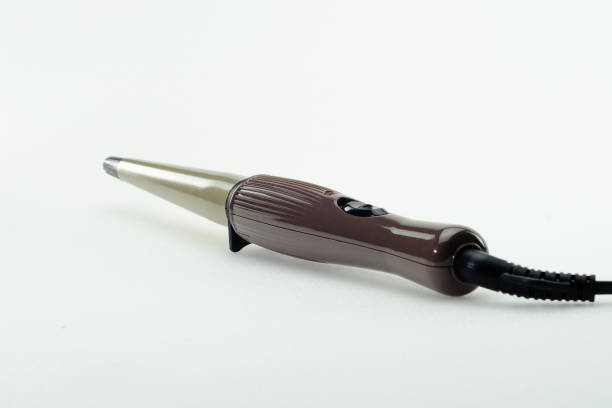 istock Hair iron on white background with copy space 1206851762