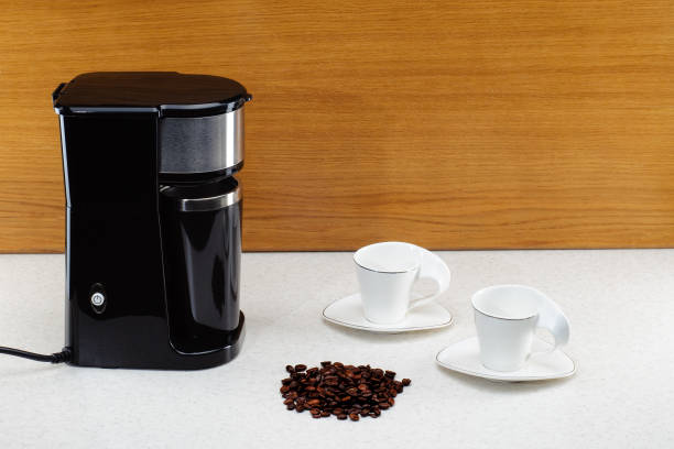 istock Espresso coffee machine on woody marbled background 1206852147