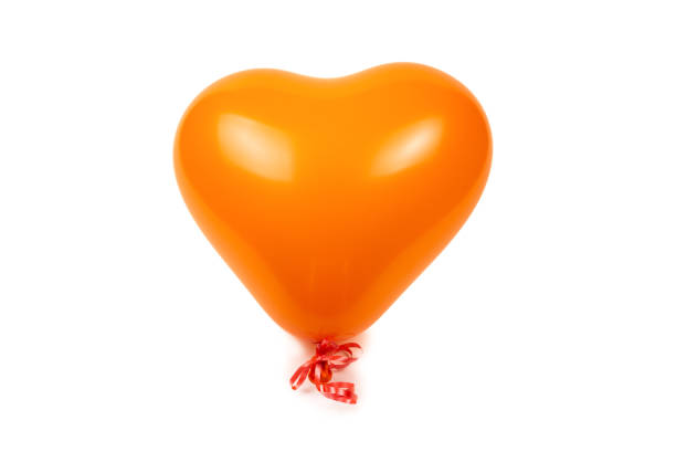 istock Orange heart ballon isolated on white background. 1206855147