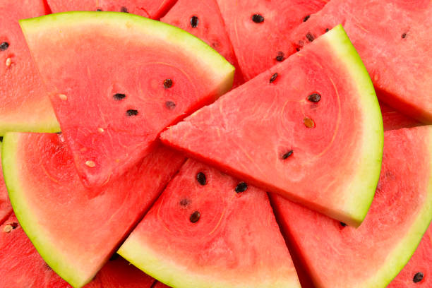 istock Juicy watermelon slices background. Top view. 1206855345