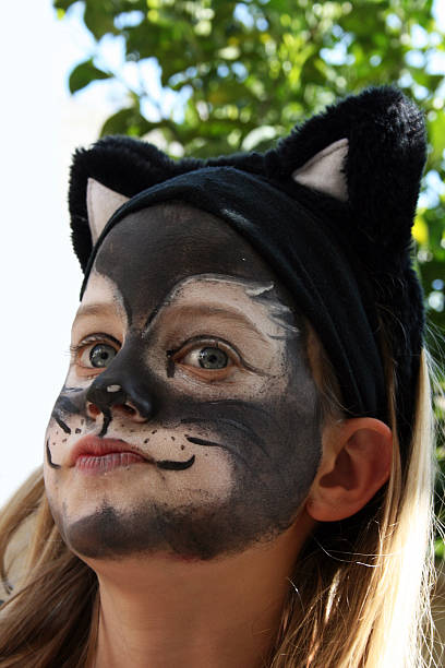 istock girl dressed up as a cat 120686069