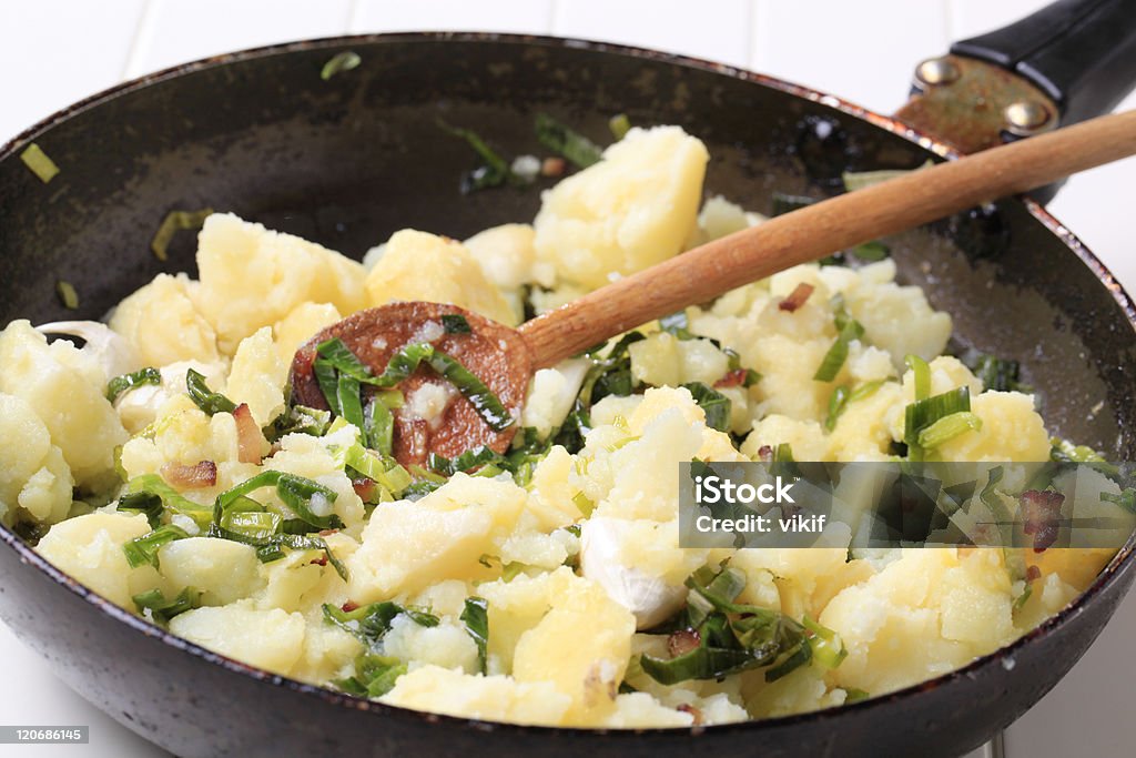 Potato side dish Crushed potatoes stir fried with spring onion and garlic Crushed Stock Photo