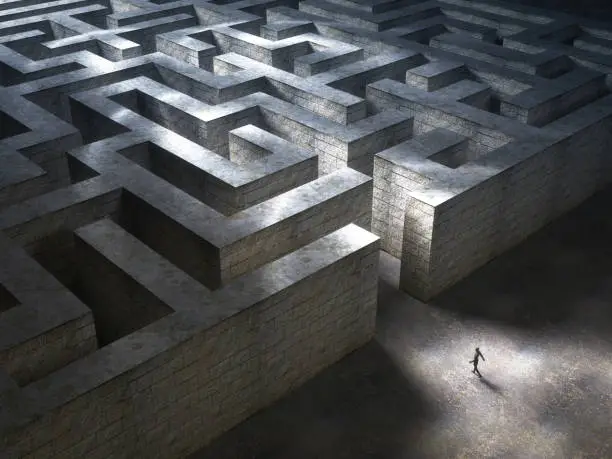 Photo of Man entering a huge mysterious maze. 3D Rendering
