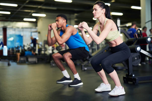 istock Exercising in sports center 1206864072