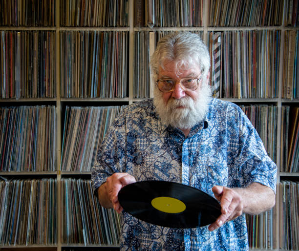istock Record collector in front of his collection 1206864810