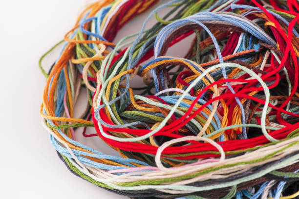 istock Heap of colorful embroidery threads 1206865774