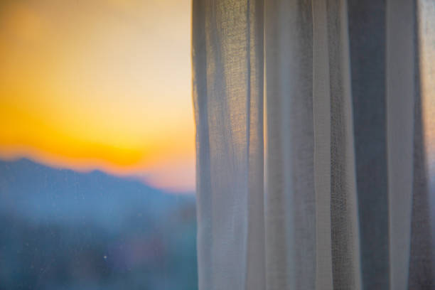 istock Window with curtain in the morning 1206869526