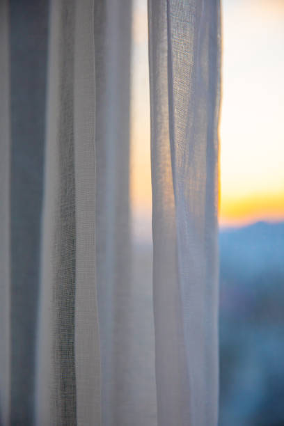 istock Window curtain in the morning 1206869987
