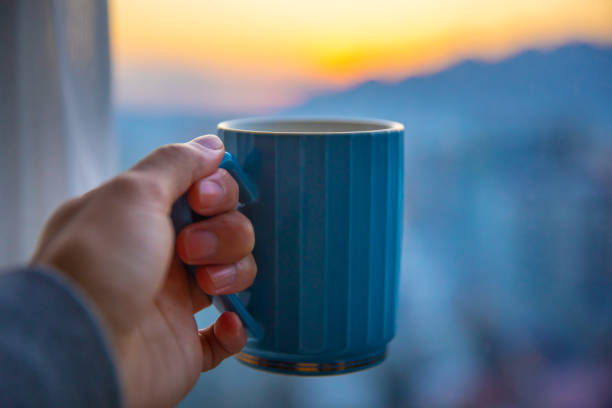 A Dark Blue Ceramic Mug Standing On A White Background, Featuring A Smooth Glossy Surface And A Simple Handle, Ideal For Coffee, Tea, Or Hot Beverage Themes.