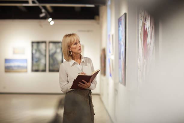 istock Mature Art Gallery Manager 1206870282