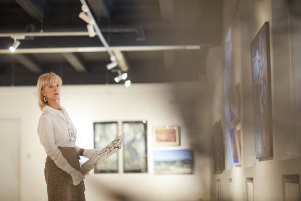 istock Female Art Expert Managing Exhibition 1206870284