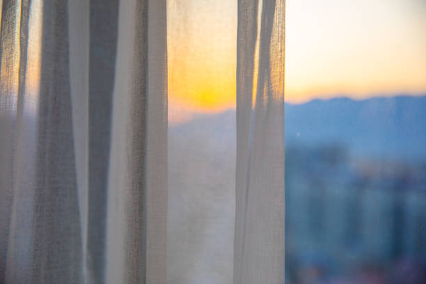 istock Window curtain in the morning 1206870460